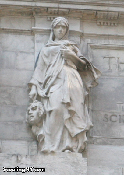 Is That A Woman Holding A Decapitated Head on the New York Public Library?